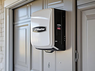 Professional Installation of Modern Garage Door Opener in La Mesa Technician installing a new garage door opener system on a residential garage in La Mesa, CA