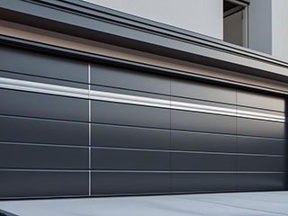 Contemporary overhead sectional garage door with sleek horizontal panels on a residential property in La Mesa.